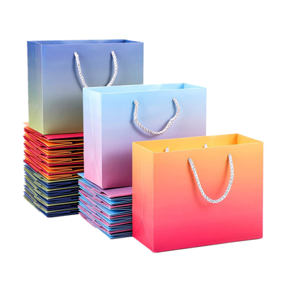 ซื้อ กระเป๋าใส่กระดาษพิมพ์ลายโฮโลแกรมพร้อมที่จับริบบิ้น Pantone online manufacture